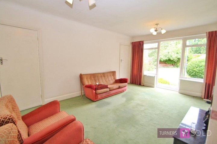 View of living room in bungalow, in Epsom, for sale with Turners Property. 